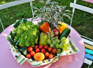 Fruit-basket,grapes,tomatoes,cucumber,broccoli,peach,pear apple and peppers.(Perfact foods to introduce to just weaned babies)