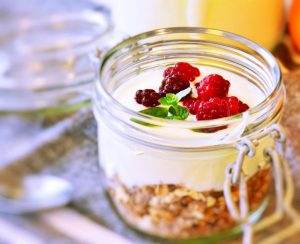 Muesli , Cornflakes,ln Milk With Strawberries.(Perfact foods to introduce to just weaned babies)