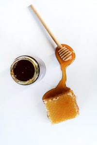 Cultivated pure honey in jar 