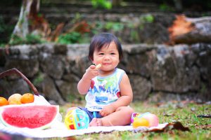 Self feeding baby.