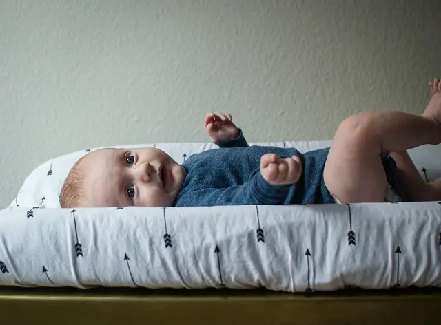 Diaper change in Baby milestones from birth up to 2 months. 