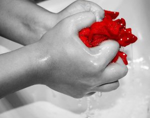 Hand washing clothes in how to get baby poop stains out of clothes