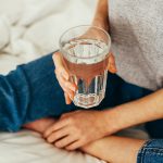 water glass with water in , what causes newborn hiccups.