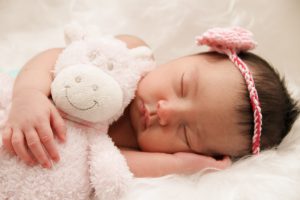 Sleeping baby in How often to bathe newborn