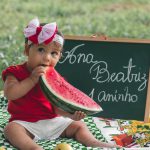 Baby eating watermelon ; 9 month old baby food menu.