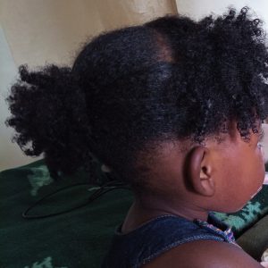 Baby with clean curly hair.