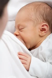 Baby breastfeeding ; How often to feed newborn.