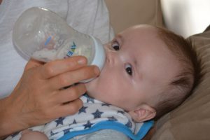 baby feeding at night. Cluster feeding newborn 