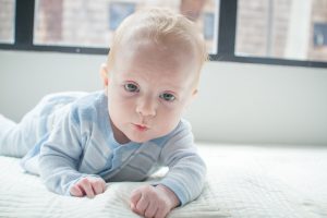 Baby lying on belly ;When does baby hair grow back after falling out.