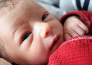 newborn baby in ;Baby hair growth stages