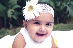 Baby wearing a headband; When does baby hair fall out ?