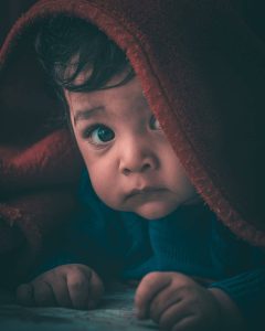 Toddler peeping under a blanket; Why won’t my toddler sleep through the night