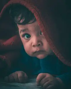 Toddler peeping under a blanket; Why won’t my toddler sleep through the night