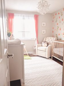 Peach and white baby room in Baby girl room ideas not pink